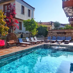 https://kusadasi-sezgins-boutique-rooms.aegeanhotels.net